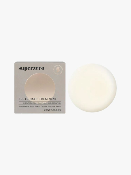 Superzero Instant Shine and Anti-Frizz Hair Serum Treatment Bar in branded component on a light gray background